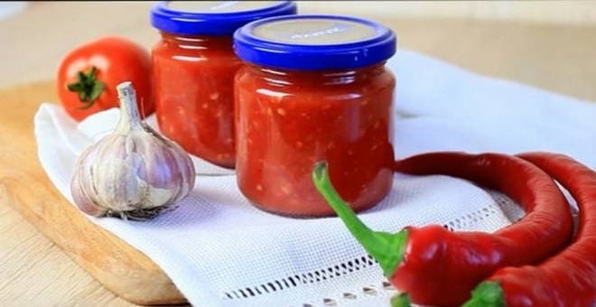 Adjika from tomatoes with garlic and pepper with cooking for the winter - 5 step by step recipes with a photo