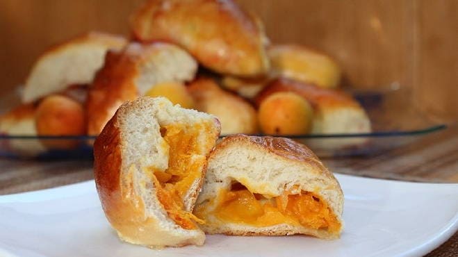 Pies with apricots in the oven