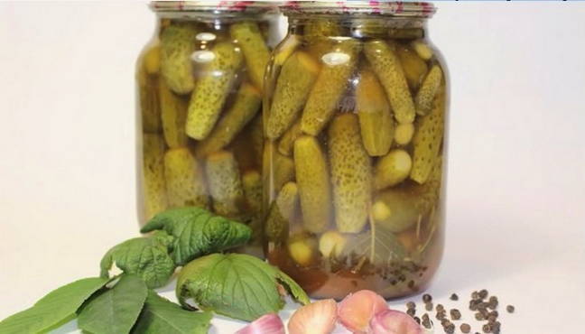 Cucumbers with chili ketchup with sterilization