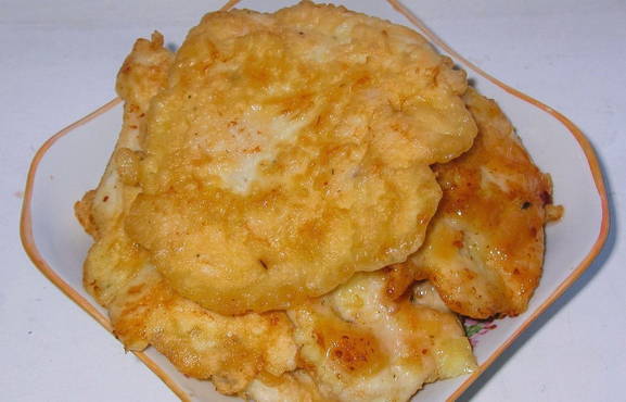 Chicken chops with mayonnaise in a pan