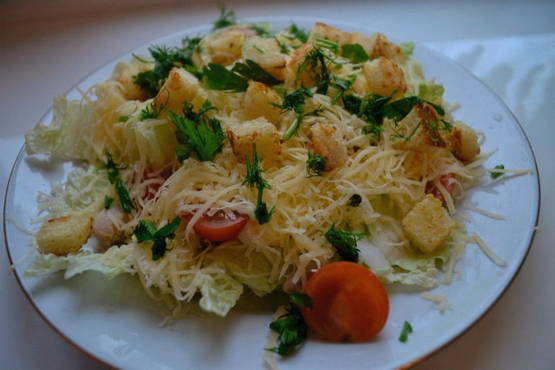 Chicken salad with croutons and Chinese cabbage