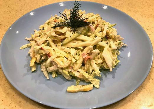 Crab salad with cabbage and cheese