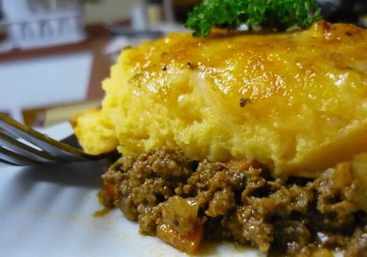 Potato casserole with minced meat in a slow cooker