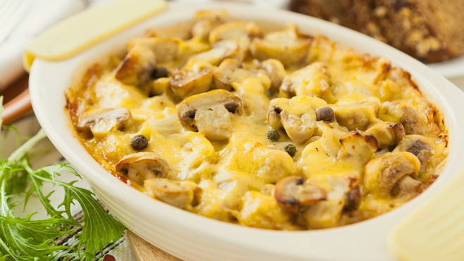 Potato casserole with mushrooms and tomatoes