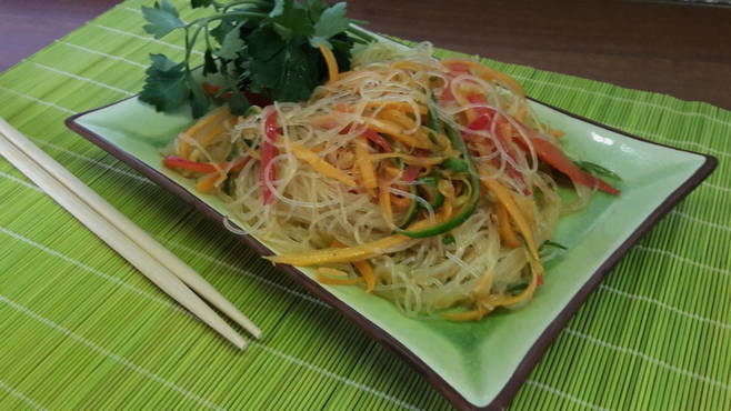 Salad with funchose and vegetables in soy sauce