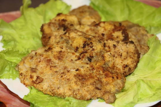 Pork chops in a frying pan without batter