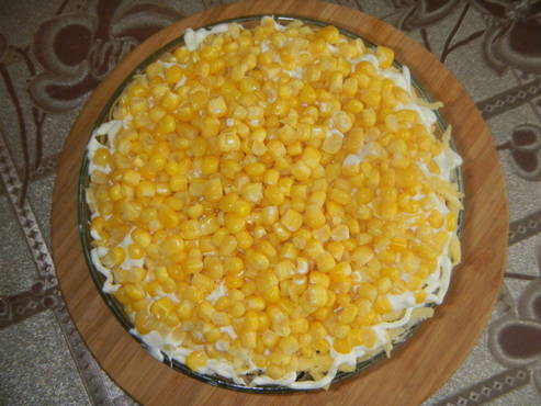 Salad with chicken, mushrooms, cheese and corn