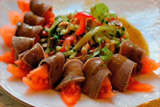Salad with tongue, mushrooms and bell pepper