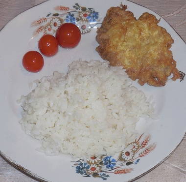 Pork chops with onions in a pan