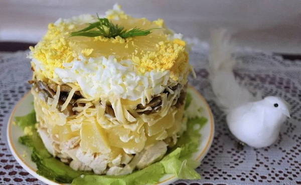 Salad with canned pineapple and mushrooms