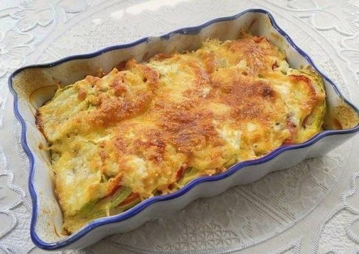 Zucchini casserole with cheese and sour cream