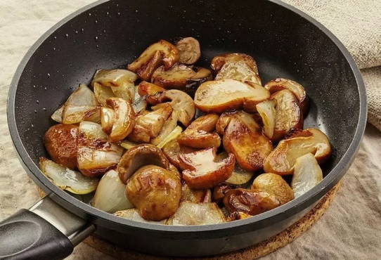 Fried porcini mushrooms in a pan