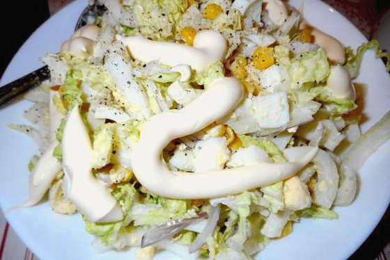 Salad with squid, egg and Chinese cabbage