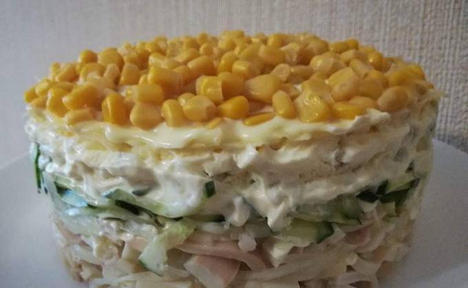 Salad with squid, corn, cheese and egg