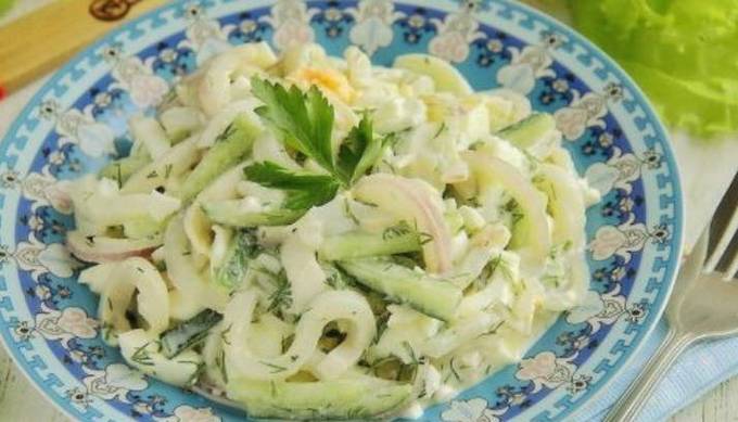 Salad with squid, egg, cucumber and mayonnaise