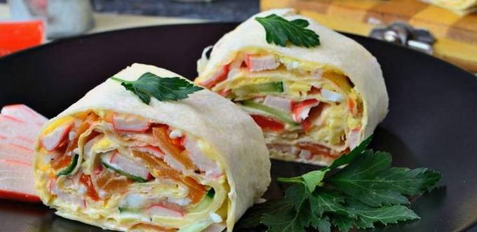 Lavash roll with crab sticks, cucumber, egg, cheese and garlic