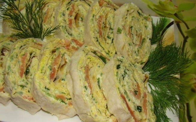 Lavash with red fish, melted cheese, cheese and herbs