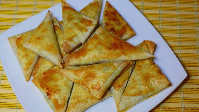Lavash envelopes with cottage cheese in the oven