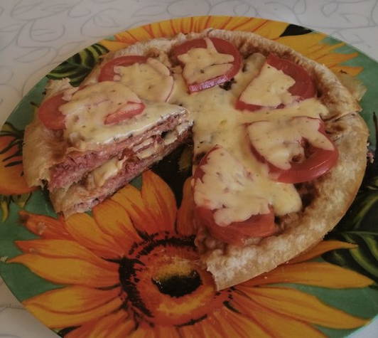 Armenian lavash pizza in a pan