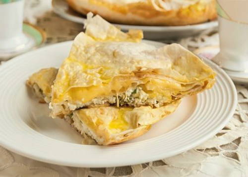 Lazy pita bread with cottage cheese in a pan