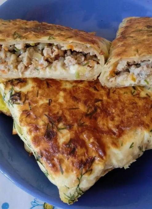 Lavash pies with minced meat in a pan