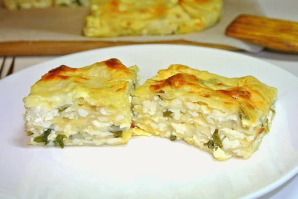 Kefir lavash pie with cheese and cottage cheese