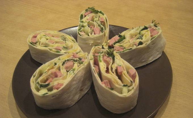 Lavash with sausage, cheese and cucumber