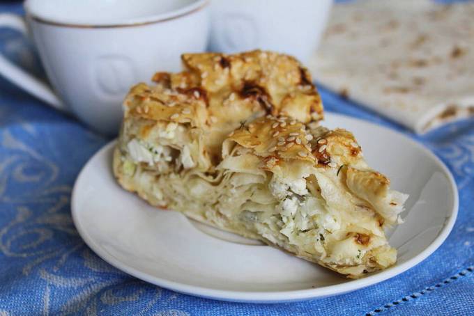 Lavash snail with cottage cheese and cheese