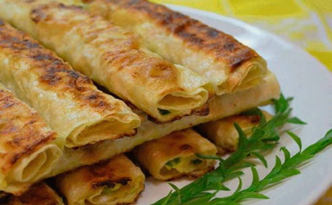 Lavash with cottage cheese, cheese and egg