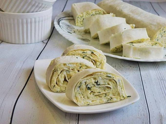 Lavash roll with egg, cheese, garlic and herbs