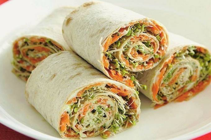 Lavash with red fish, cheese and cucumber