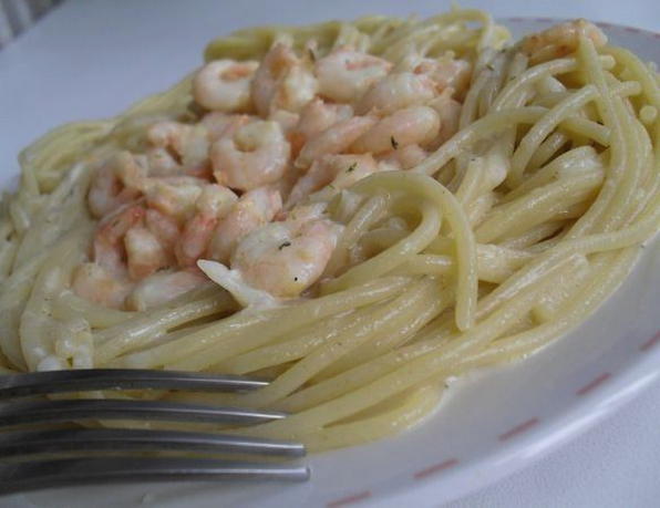 Pasta carbonara with shrimps in a creamy sauce