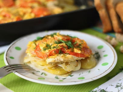 Potato casserole with chicken fillet and tomatoes