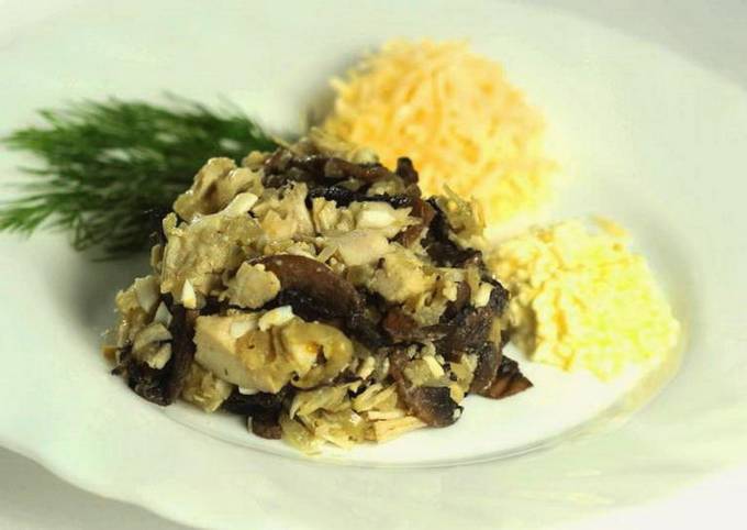 Salad with chicken, cheese, walnuts and prunes