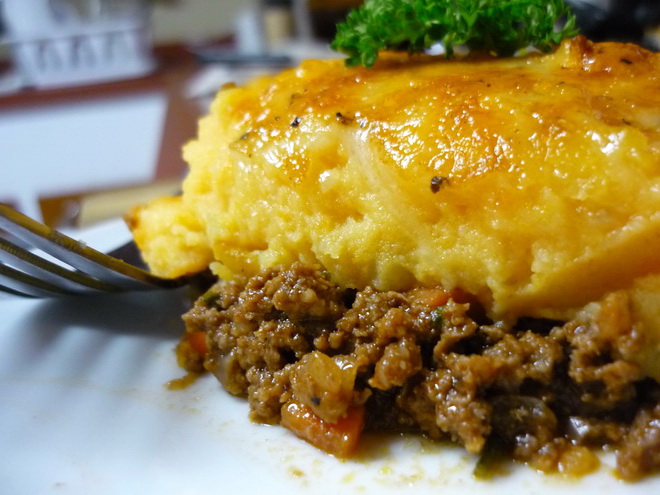Minced meat and mashed potatoes casserole in a slow cooker