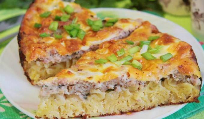 Pasta casserole with minced meat, cheese and cream