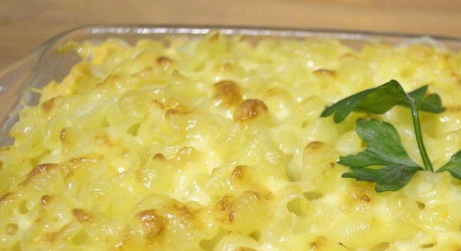 Pasta casserole with minced meat and mushrooms in the oven