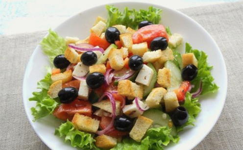 Greek salad with feta cheese and croutons