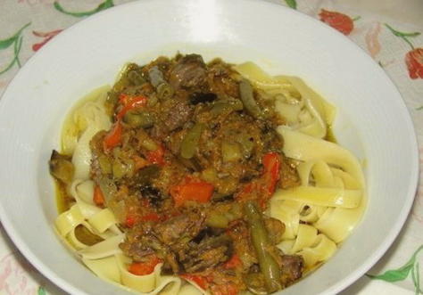 Pork lagman with eggplant