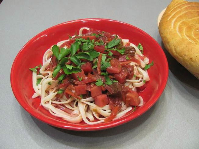 Beef lagman with potatoes and noodles