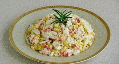 Crab salad with corn, egg, rice and mayonnaise