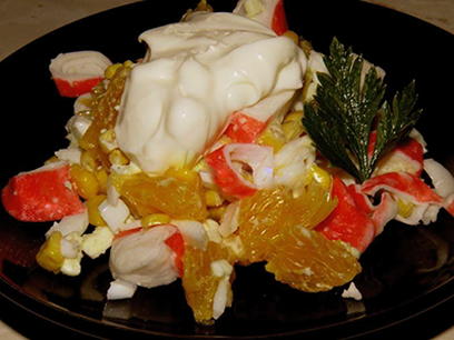 Crab salad with corn, orange and egg
