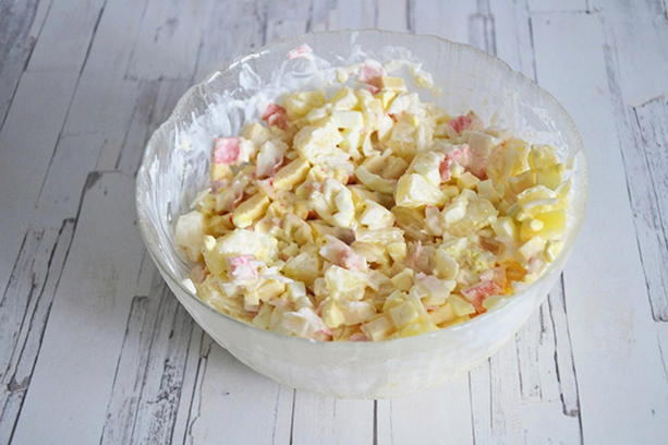 Crab salad with corn, eggs and pineapple