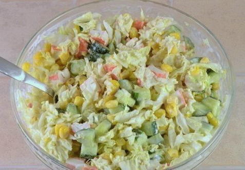 Crab salad with corn, cucumber, tomatoes and Chinese cabbage