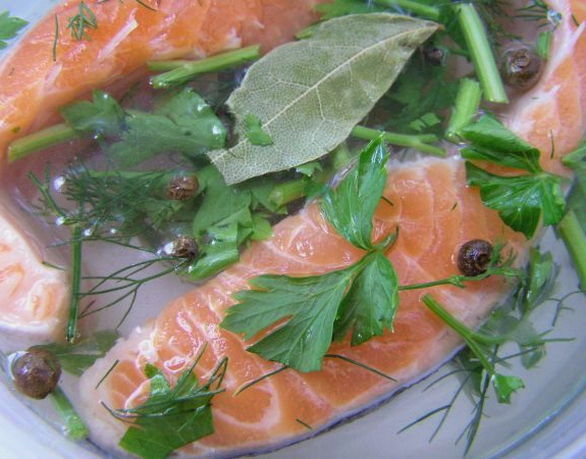 Salted pink salmon in slices under salmon