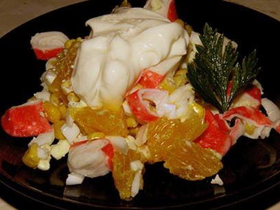 Salad with crab sticks, corn and orange