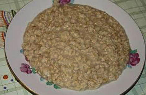 Liquid oatmeal porridge on the water