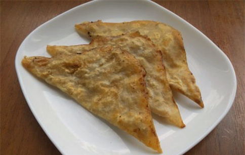 Lavash chebureks with minced meat in a pan