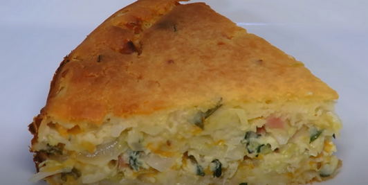 Jellied milk pie with cabbage and egg in the oven