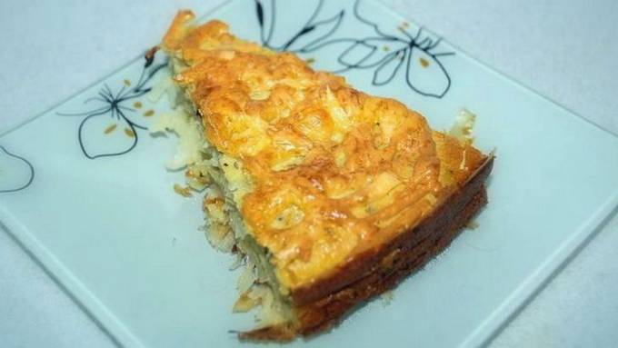Cabbage pie made from batter with sour cream and mayonnaise in the oven